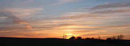 Sunset behind the alfalfa field, April 2005.