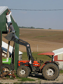 Joseph and Dainel fixing an electric wire